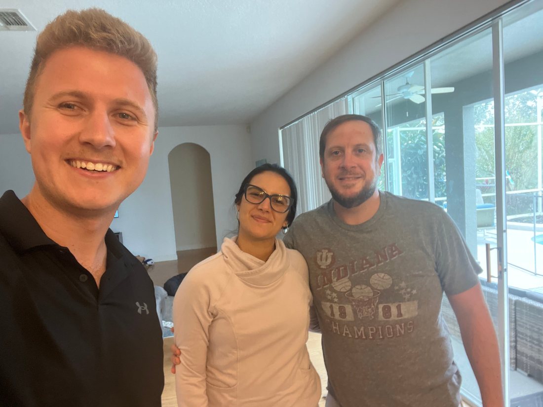 Conner Leeb with homeowners after going solar