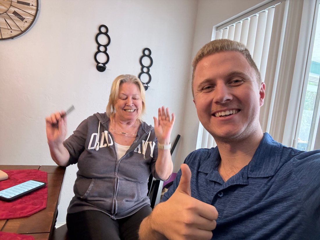 Conner Leeb with a homeowner after installation